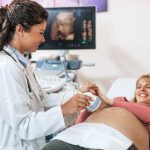 beautiful-happy-expectant-mother-gynecological-examination-with-ultrasound-medical-equipment