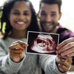 happy-couple-with-pregnancy-news